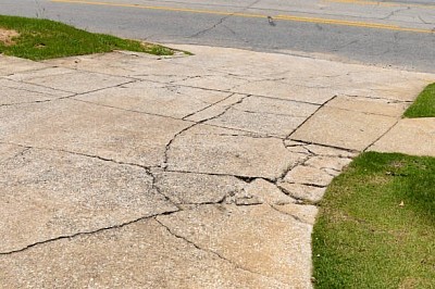 Distressed concrete driveway.